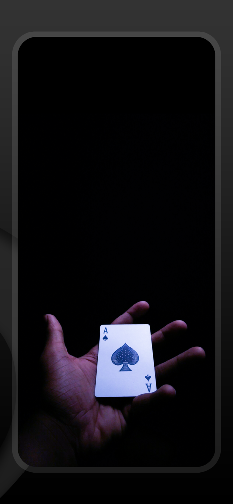 Stigma 6 - Magic Trick Tricks - A hand holding the Ace of Spades playing card as part of a magic trick prediction