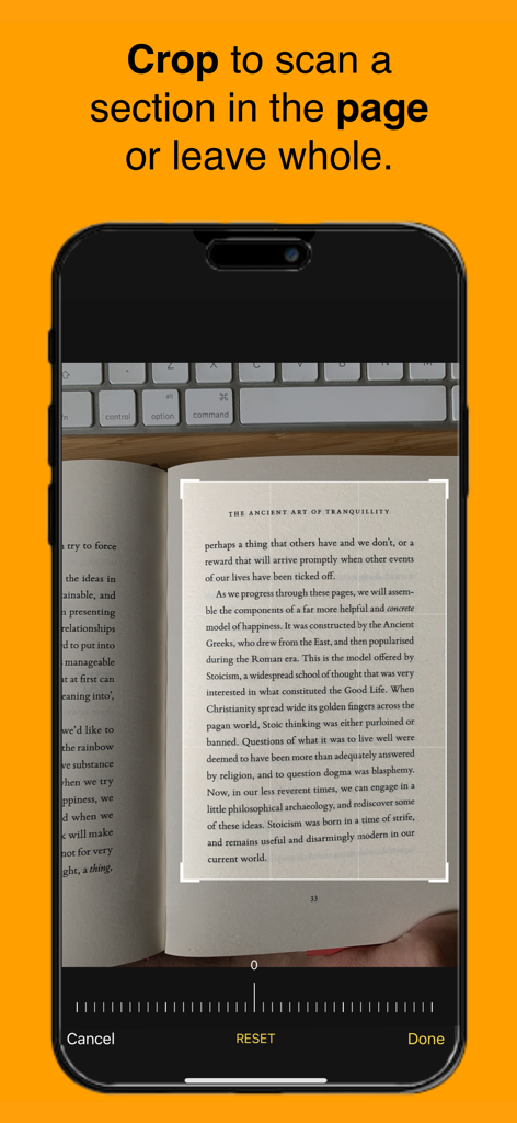 Page Reader - iPhone screenshot of the Page Reader app showing the crop tool used to select a section of text from a physical book for scanning.