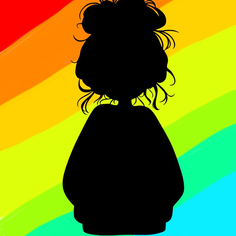 girl with baggy sweatshirt and messy bun