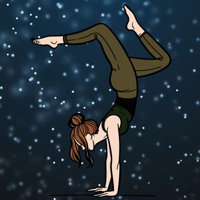 a woman doing a handstand