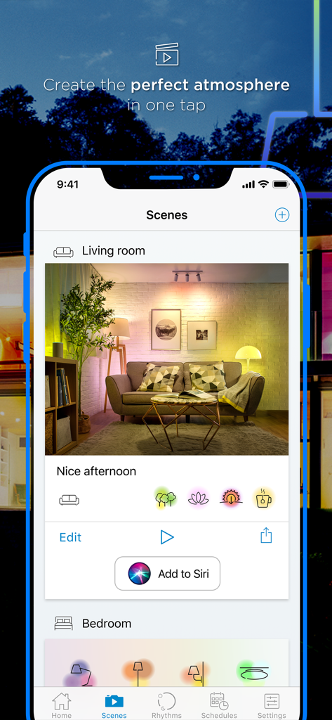 WiZ legacy app interface showing the scenes menu for controlling smart home lighting in a living room.