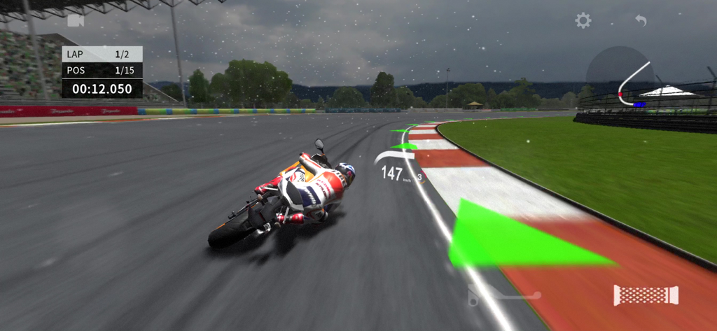 Real Moto 2 - Real Moto 2 gameplay featuring a motorcycle racer leaning into a turn on a professional track