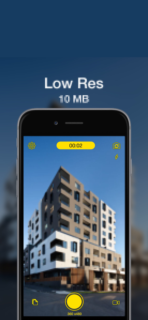 A smartphone screen showing the LOWER camera app capturing a pixelated low resolution image of a modern building