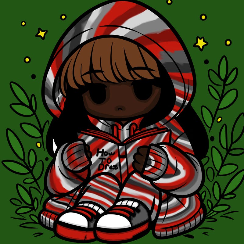 girl in oversized hoodie reading a book