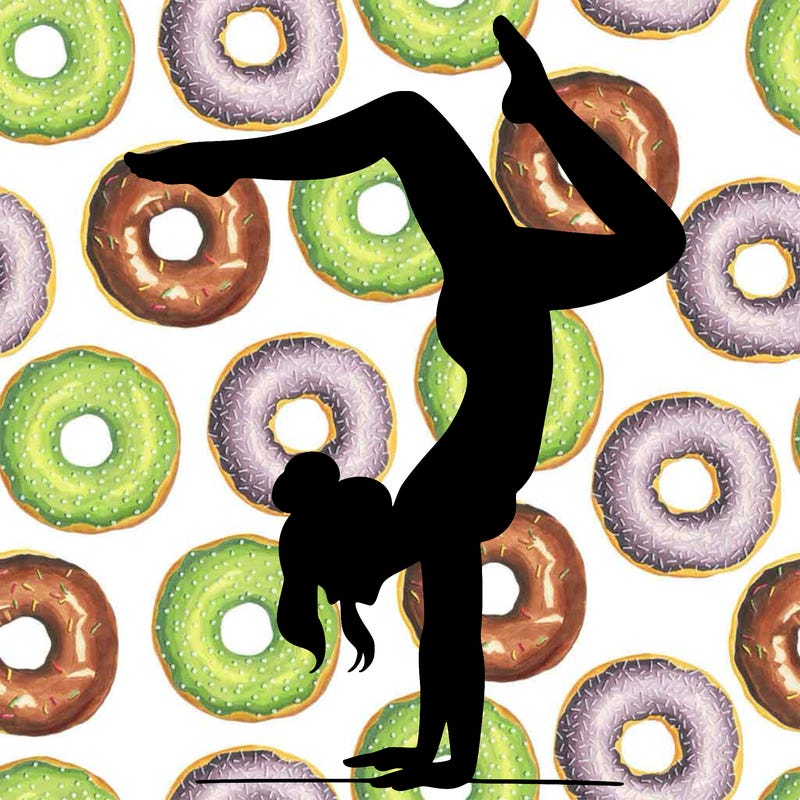 a woman doing a handstand