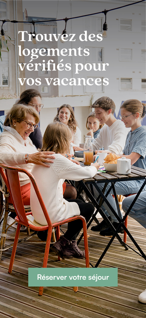 A family sharing a meal outdoors at a verified vacation home rental