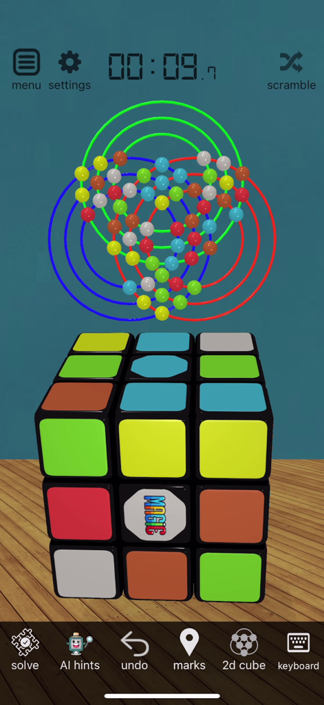 Interface of the 3D Magic Cube Solver app showing a virtual 3D cube and a 2D colored map overlay