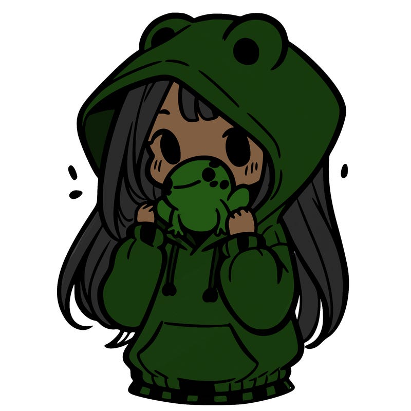 a girl holding a froggy hoodie