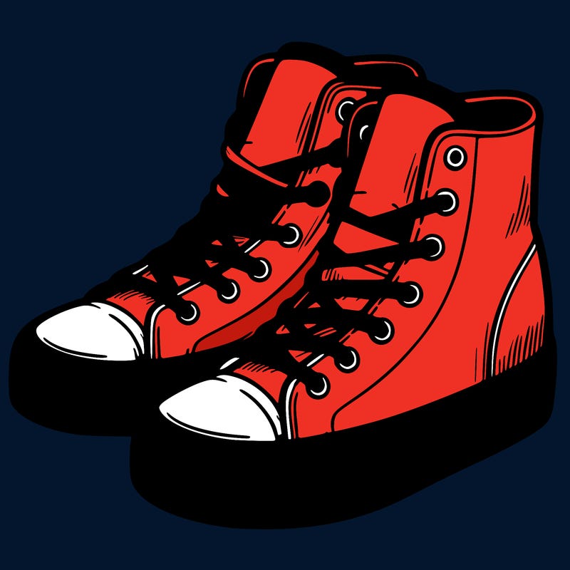 a pair of high top tennis shoes