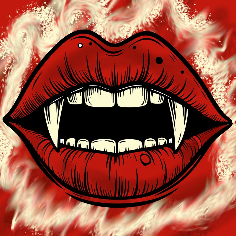 lips with vampire teeth