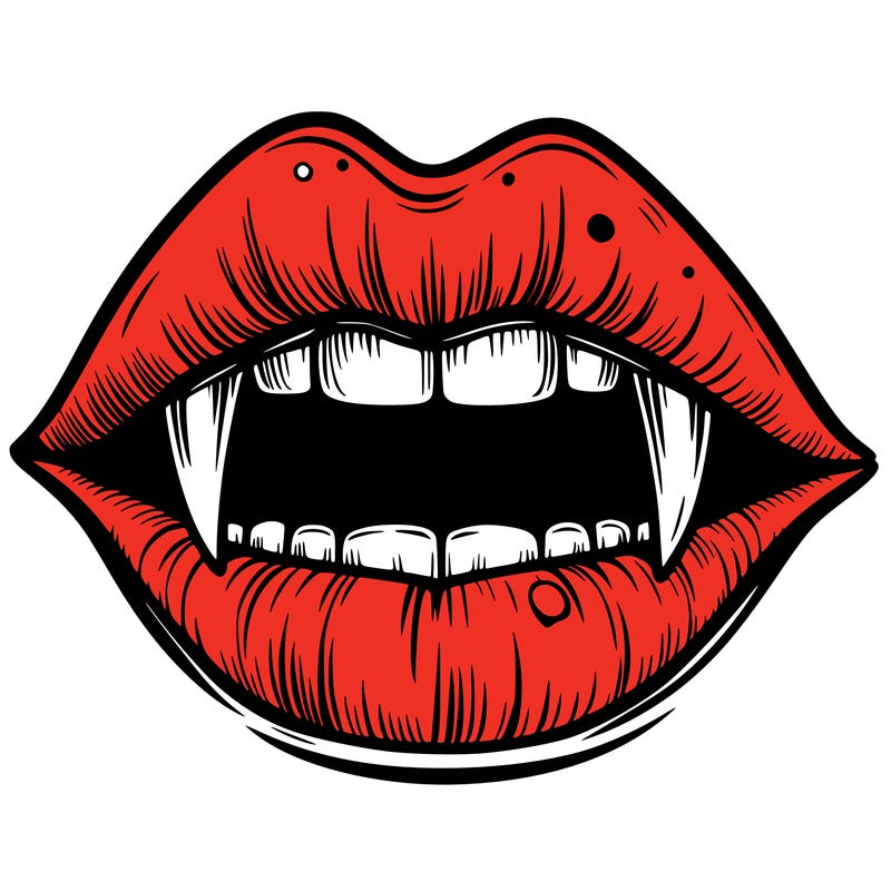 lips with vampire teeth