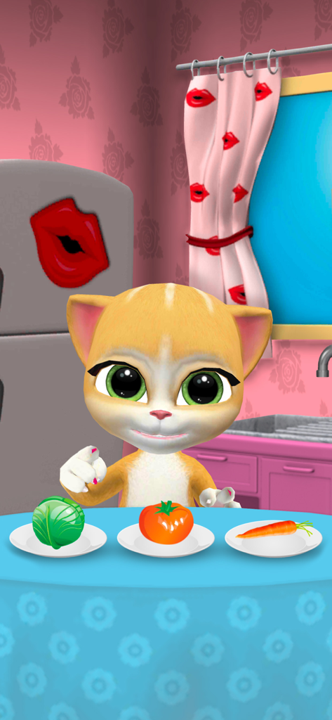 My Talking Cat Emma - Mi Gata que Habla Emma sentada en una mesa de comedor con platos de repollo, tomate y una zanahoria