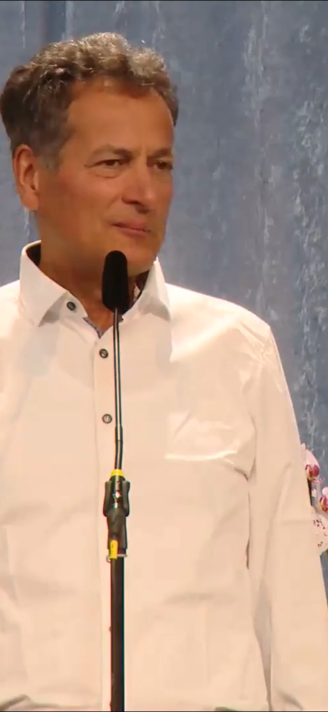 BGF InfoCenter - A community leader speaking during an online event on the BGF InfoCenter app.