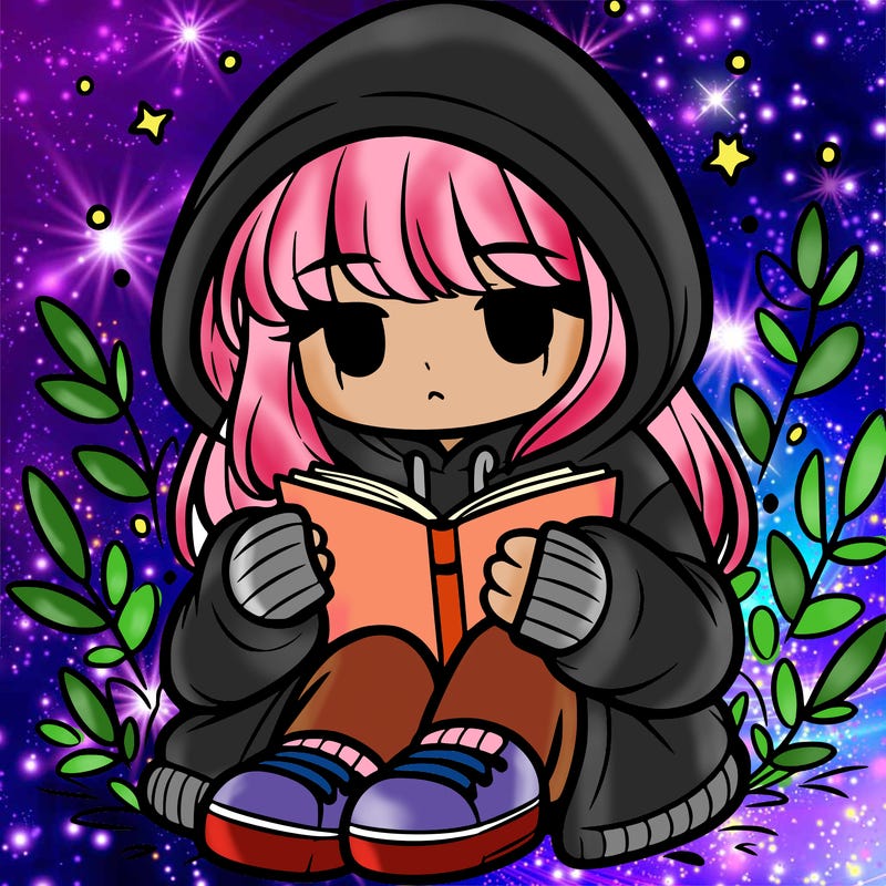 girl in oversized hoodie reading a book