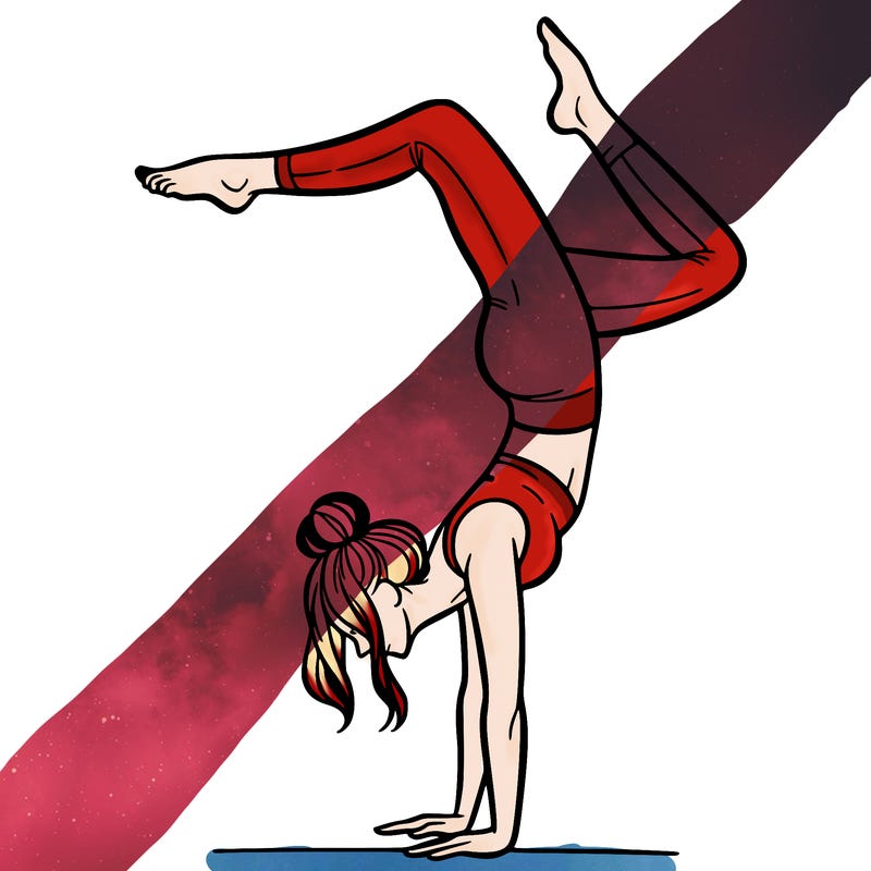a woman doing a handstand