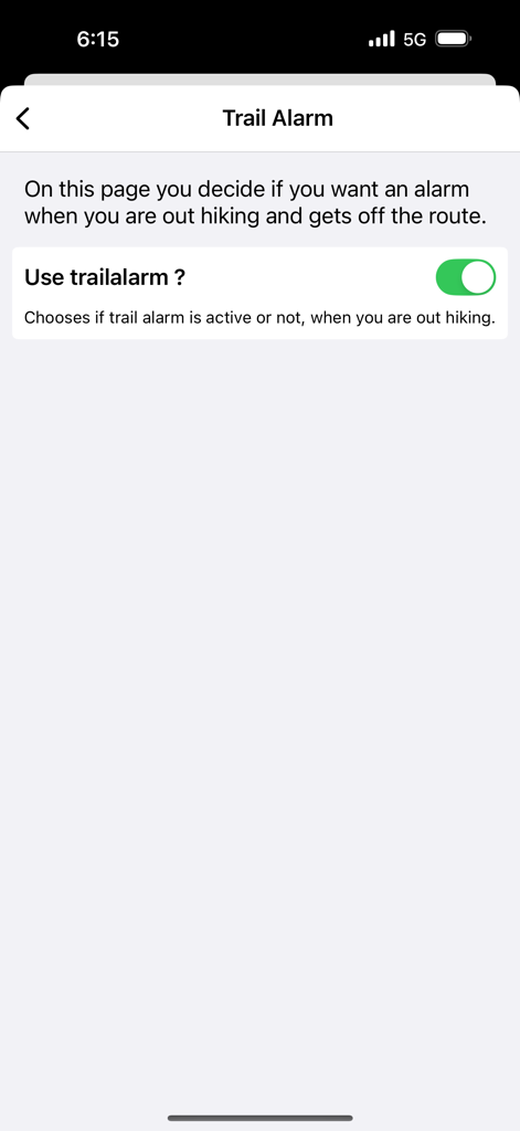 Trail Alarm settings screen in the GR 20 Corsica app with a toggle switch to enable off route notifications