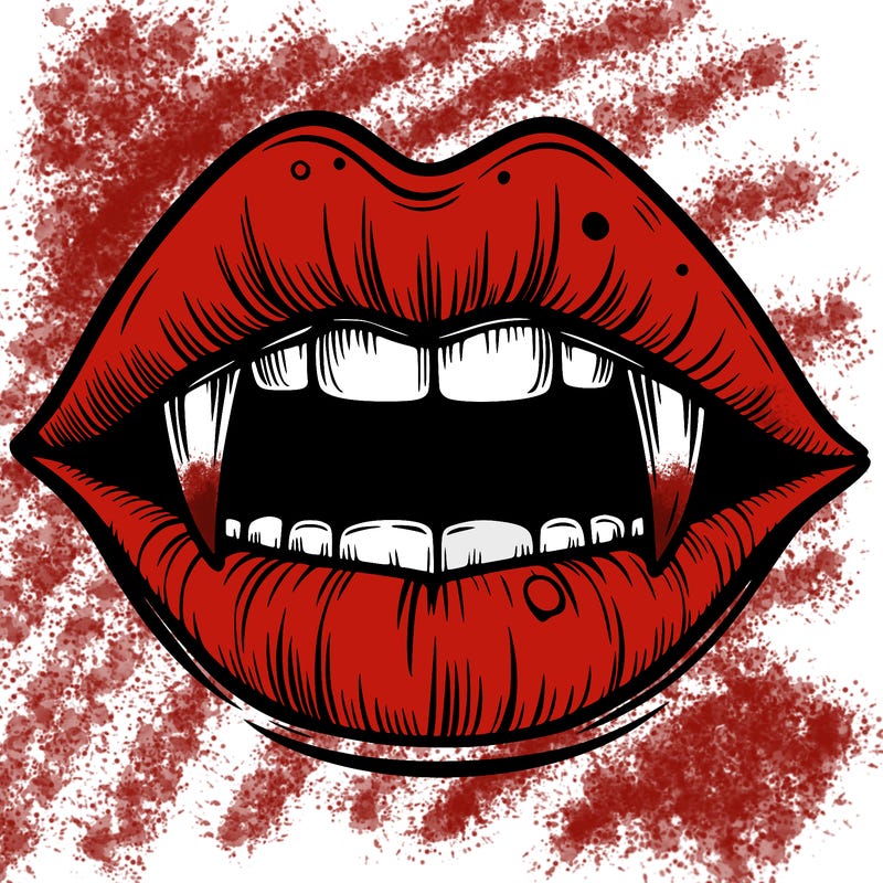 lips with vampire teeth
