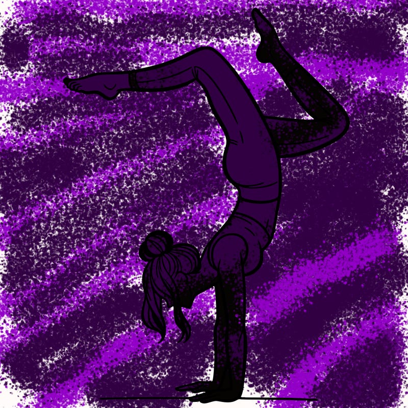 a woman doing a handstand