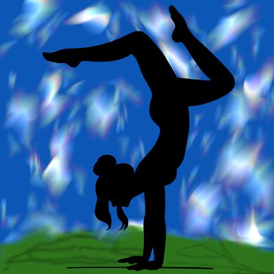 a woman doing a handstand