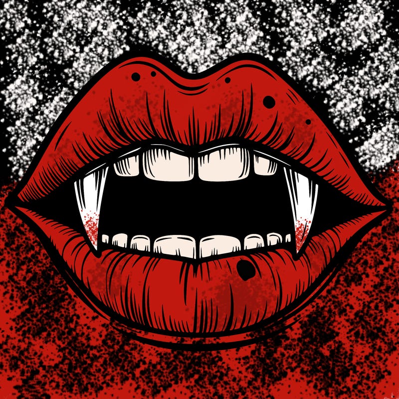 lips with vampire teeth