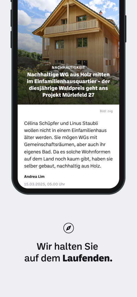 Smartphone displaying a local news article about a sustainable wooden house project in the bz Zeitung aus Basel app.