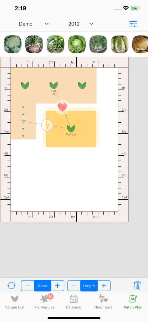Veggie Garden Planner - Editor visual de diseño de parcela de huerto mostrando relaciones de cultivo asociado para col rizada, tomates y guisantes