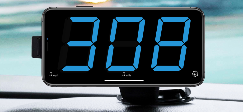 GPS Speedometer COA app showing a digital speed of 308 on a smartphone mounted to a car dashboard