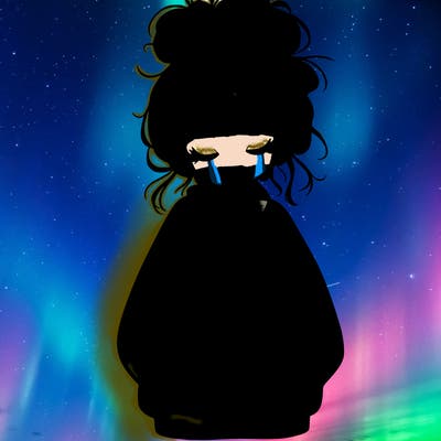 girl with baggy sweatshirt and messy bun