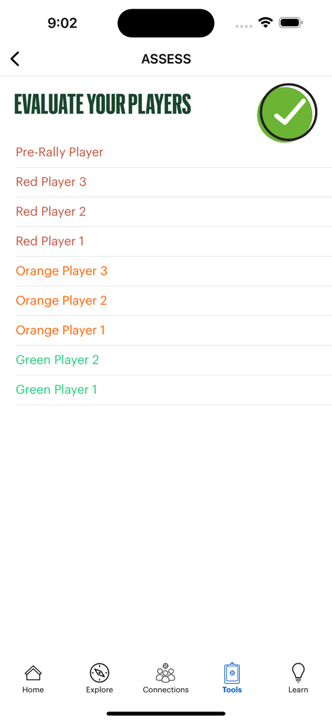 Tennis coach player evaluation screen with skill levels ranging from red to green ball