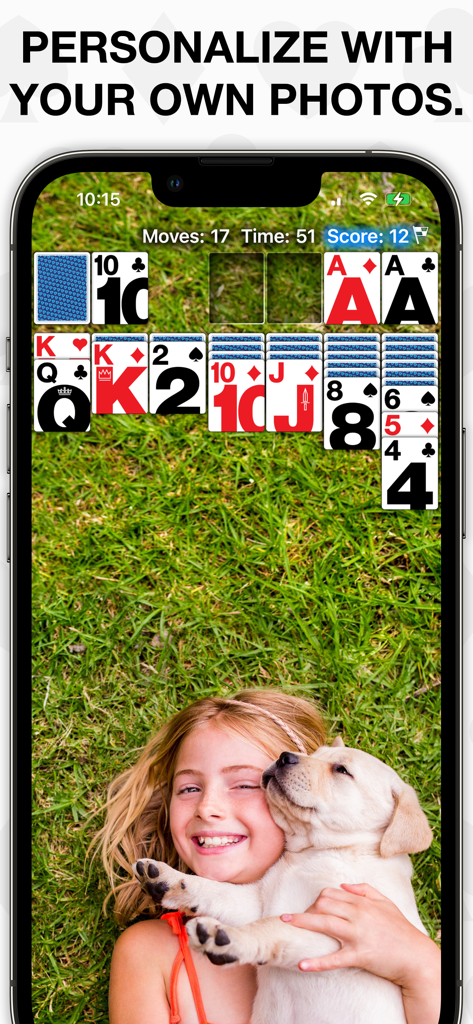 Real Solitaire Pro - Real Solitaire Pro game screen showing a personalized background photo of a child and a puppy.