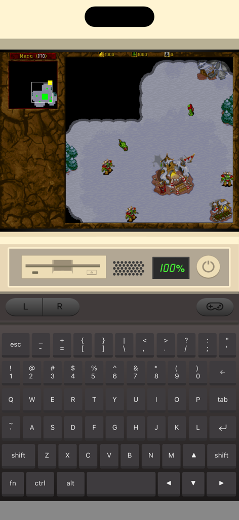 iDOS 3 - iDOS 3 app interface running a retro DOS game with a virtual PC keyboard