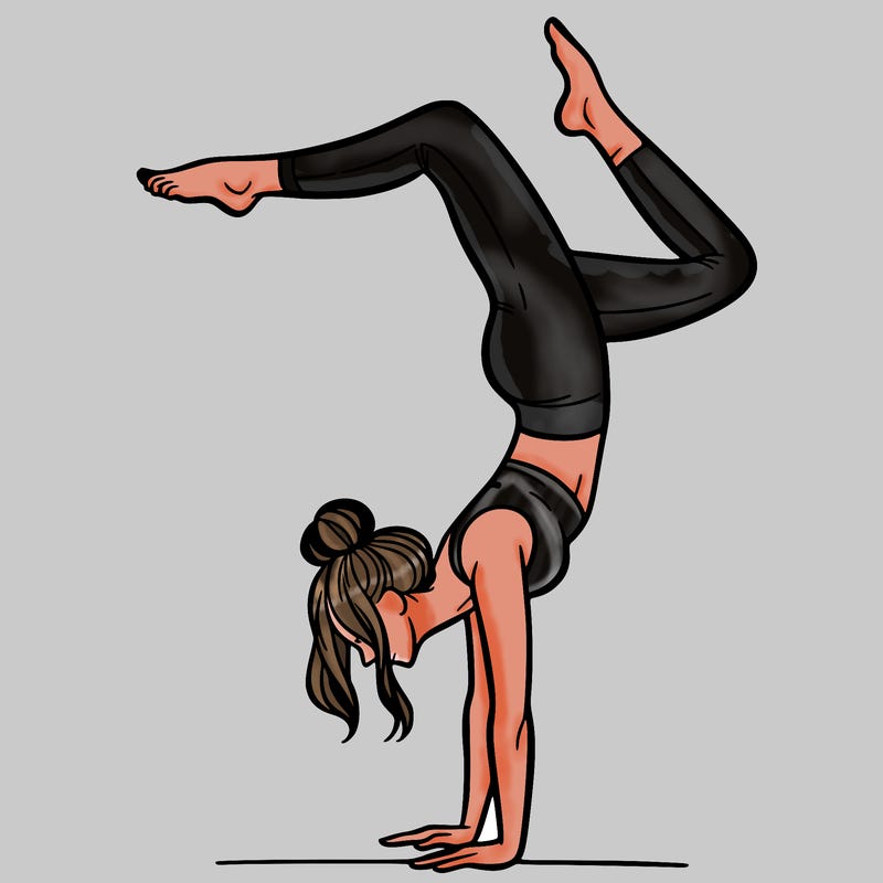 a woman doing a handstand
