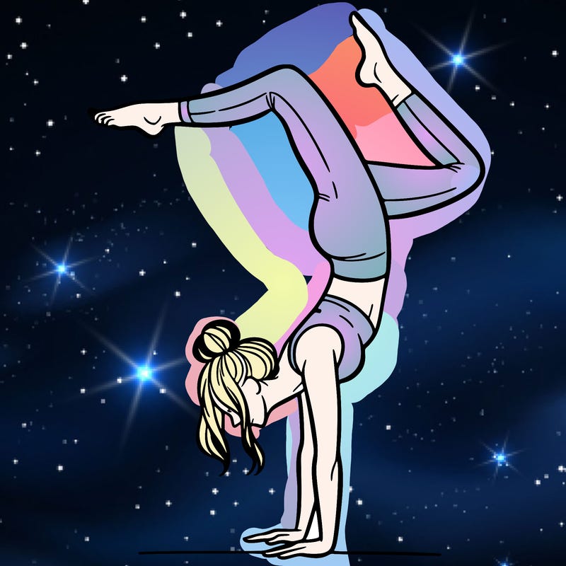 a woman doing a handstand