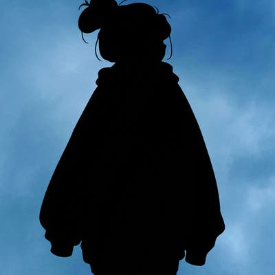 realistic girl with a oversized sweatshirt on and a bun