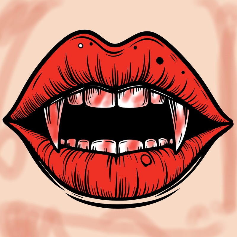 lips with vampire teeth
