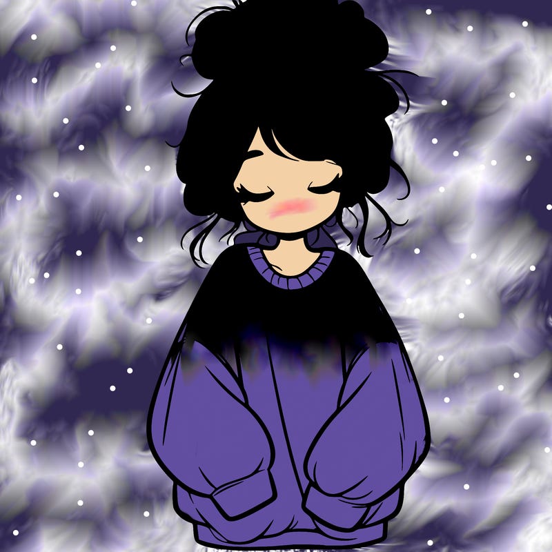 girl with baggy sweatshirt and messy bun