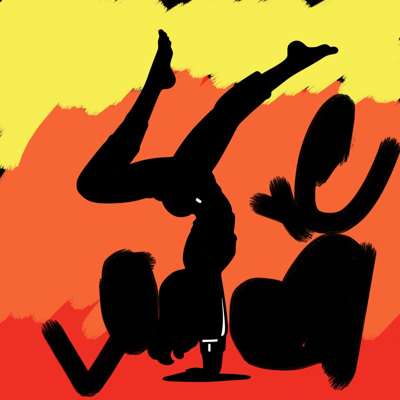 'woman doing a handstand