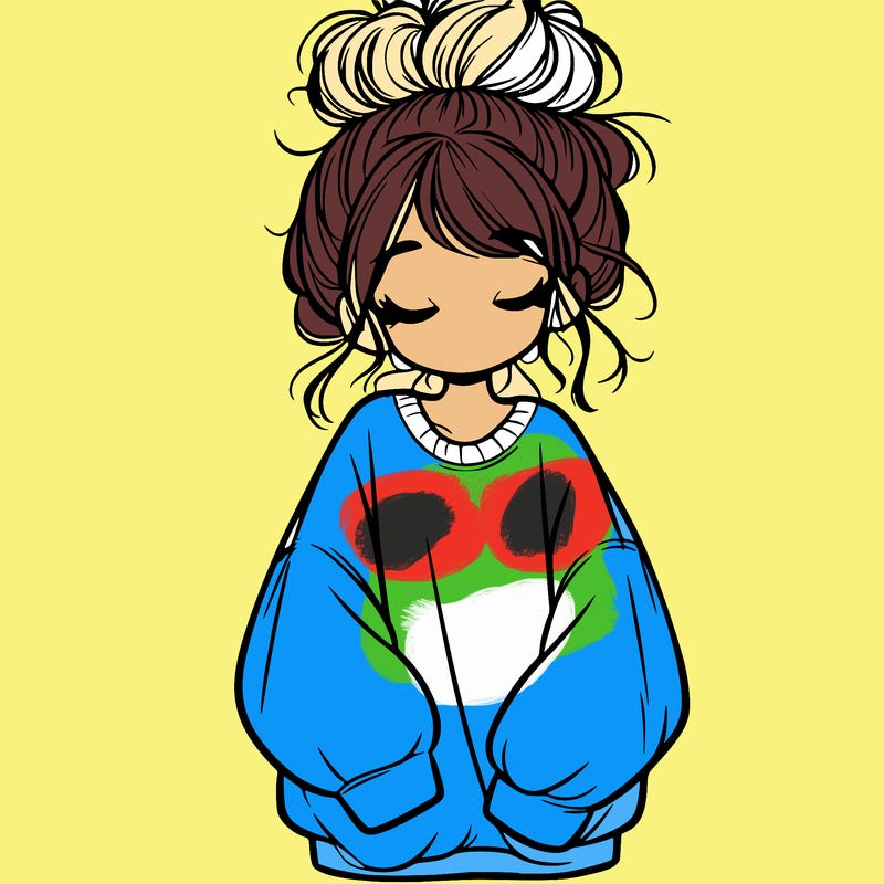girl with baggy sweatshirt and messy bun