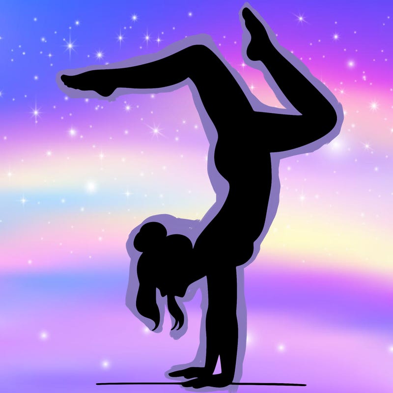 a woman doing a handstand