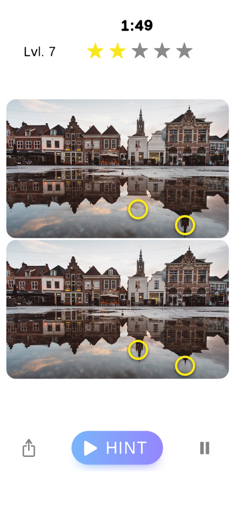 A level in Spot the Difference featuring real photography of a city square reflection with two differences highlighted.