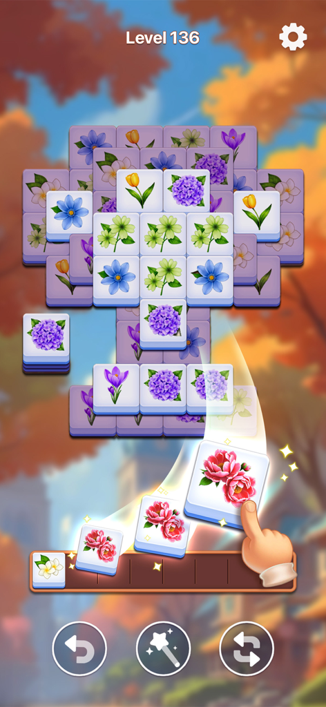 Zen gameplay of Bloom Tile matching floral tiles on a relaxing autumn background