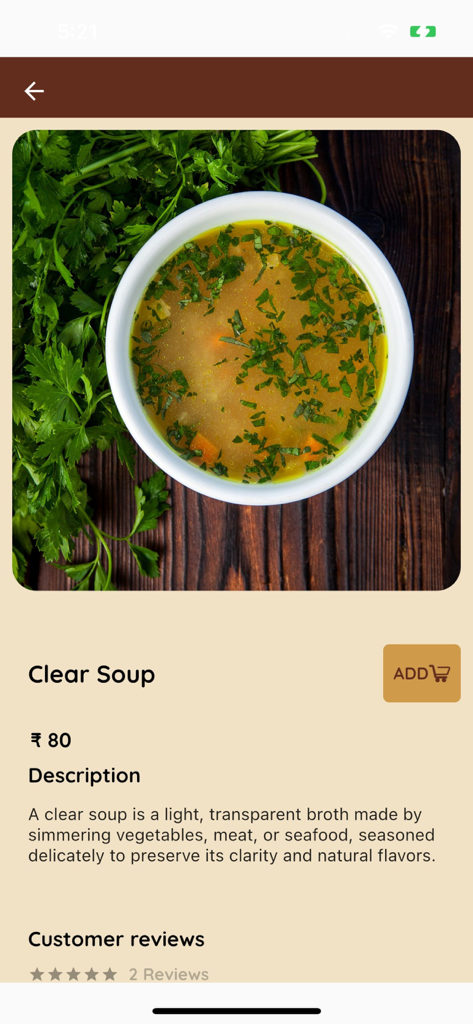 Coffee Connect Resto - cafe - Un tazón de sopa clara de verduras con hierbas en la página del producto de la app Coffee Connect Resto.