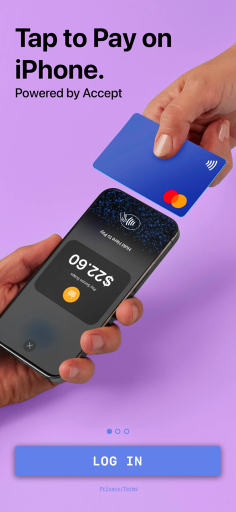 A credit card being tapped on an iPhone to process a contactless payment