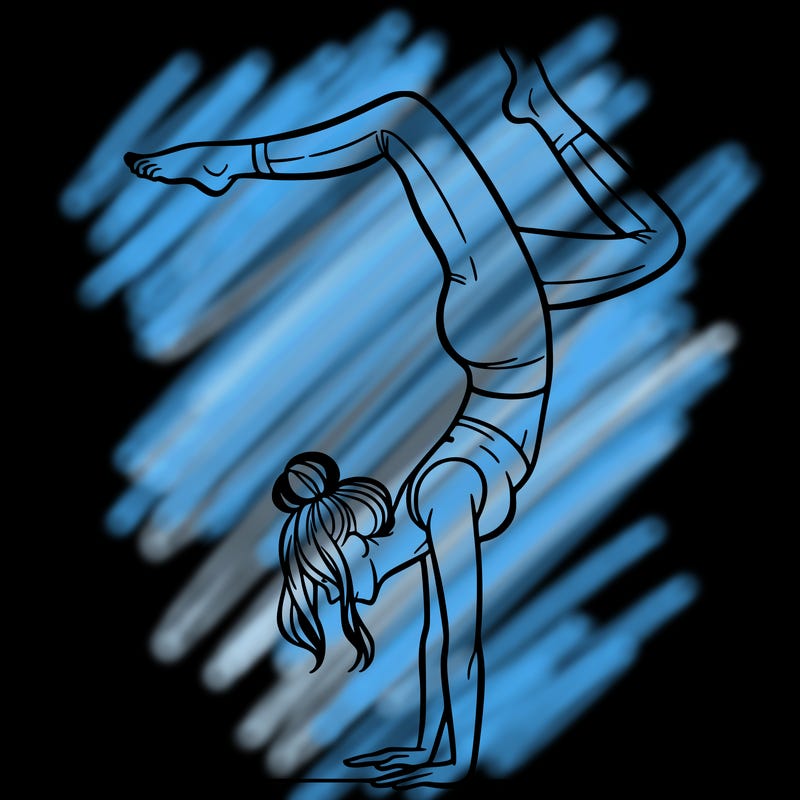 a woman doing a handstand