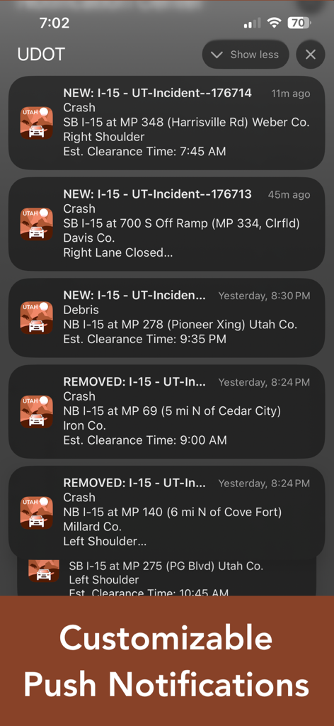 A smartphone screen displaying multiple UDOT push notifications about traffic crashes and road debris on I-15