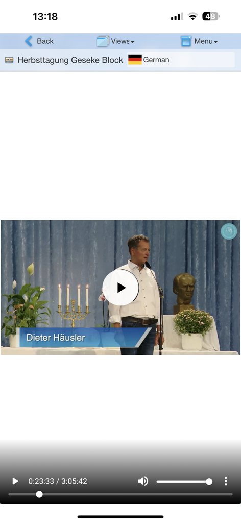 BGF InfoCenter - Video player interface showing Dieter Hausler speaking during a BGF InfoCenter community event
