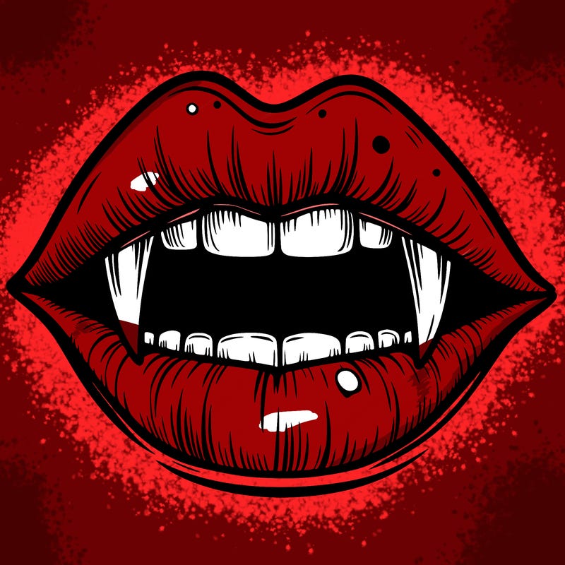 lips with vampire teeth