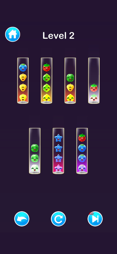 Sort Puzzle & Color Ball Games - Gameplay screen of a color sorting puzzle game showing cute fruit-shaped balls in glass tubes on a dark background