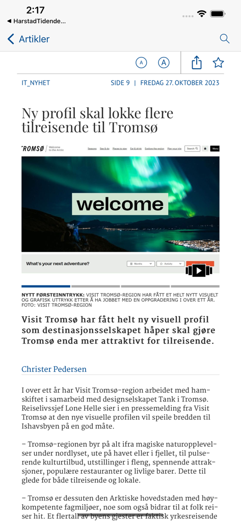 iTromsø - Captura de tela de um artigo de notícias no aplicativo iTromsø sobre turismo em Tromsø com uma imagem da Aurora Boreal.