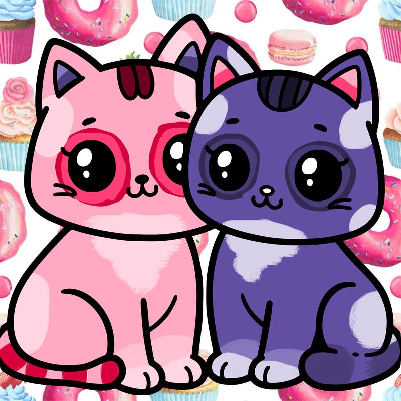 two cats next to each other